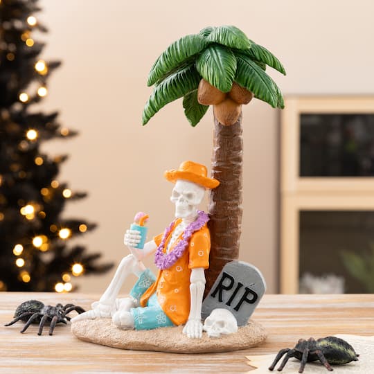 Glitzhome® 11.5" Halloween Polyresin Skeleton on Beach Table Decor